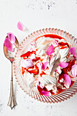 Eton Mess with strawberries and rose petals