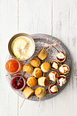 Mini scones with clotted cream and jam