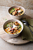 Hearty bread soup with goat’s cheese and croutons