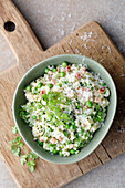 Pearl barley bowl with peas, bacon and chervil