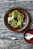 Herb and vegetable pancakes with a yoghurt dip