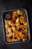 Home made vegetable crisps (potato, parsnip and beetroot) with rosemary, black pepper and sea salt