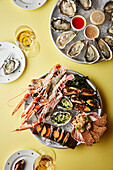 A mixed seafood platter and an oyster platter