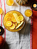 Spiced rum punch with oranges and pineapple