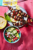 Grilled lamb kebabs served with a watermelon-and-feta salad