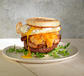 A breakfast burger with a fried egg