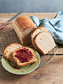 Wheat toast bread, sliced, one slice with jam