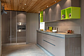 Contemporary kitchen in taupe with wooden ceiling