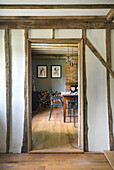 View into the dining room in dark colors