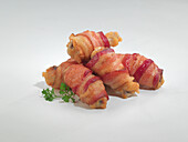 Chicken wings wrapped in bacon