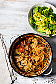 Lamb hotpot with celeriac topping served with steamed savoy cabbage