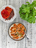 Roasted pepper pasta with anchovies and basil