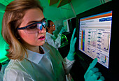 Scientist evaluating a whole genome sequencing run