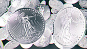 Silver coins, conceptual illustration