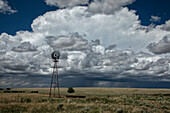 Thunderstorm with windmill, New Mexico, USA