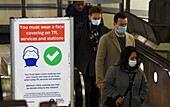 London Underground passengers wearing face masks