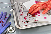 Blood-covered surgical instruments, conceptual image