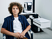 Boy in ophthalmologist office