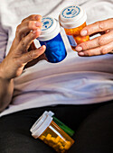 Woman examining medication