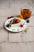A slice of cottage cheese cake with berries