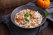 Vegan pumpkin and mushroom stew with rice