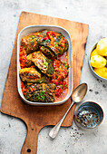 Savoy cabbage roulades in delicious tomato sauce