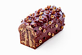 Marble cake with chocolate glaze and nuts