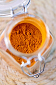 Turmeric powder in a jar