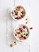 Breakfast quark with berries, muesli, and nuts
