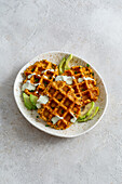 Hearty waffles with herb dip