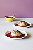 Steamed noodles with poppy seed butter and raspberry sauce