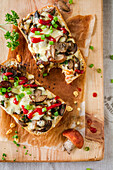 Ciabatta with forest mushrooms, cheese and ketchup