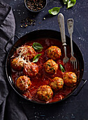 Falafel with spinach and chickpeas in tomato sauce
