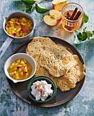 Baghrir (Moroccan pancakes) with cream cheese and apple compote