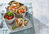 Chicken Caesar wrap and tomato salad