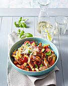 Pasta with roasted vegetables and sausages