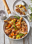 Roasted chicken drumsticks with vegetable and mushrooms
