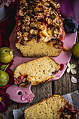 Cake with plums and almond flakes
