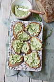 Slices of bread topped with herb butter