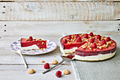 Layered Raspberry Cheesecake with Slice Removed
