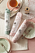 Printed paper doilies as napkin rings