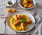 Root vegetable croquettes with pumpkin puree