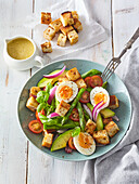 Summer salad with bread croutons