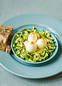 Quails eggs on bed of diced cucumber with toasted seed bread