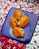 Dried baked apricots with walnuts (Turkey)