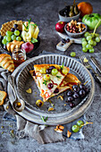 Puff pastry tart with goat cheese and grapes