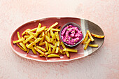Oven fries with a beetroot dip