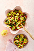 Potato salad with red, yellow, and green peppers