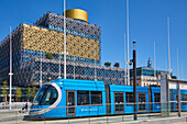 Tram in front of Library, Centenary Square, Birmingham, West Midlands, England, United Kingdom, Europe