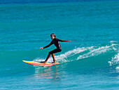 Surfer riding a wave at Ningaloo Reef, Western Australia, Australia, Pacific